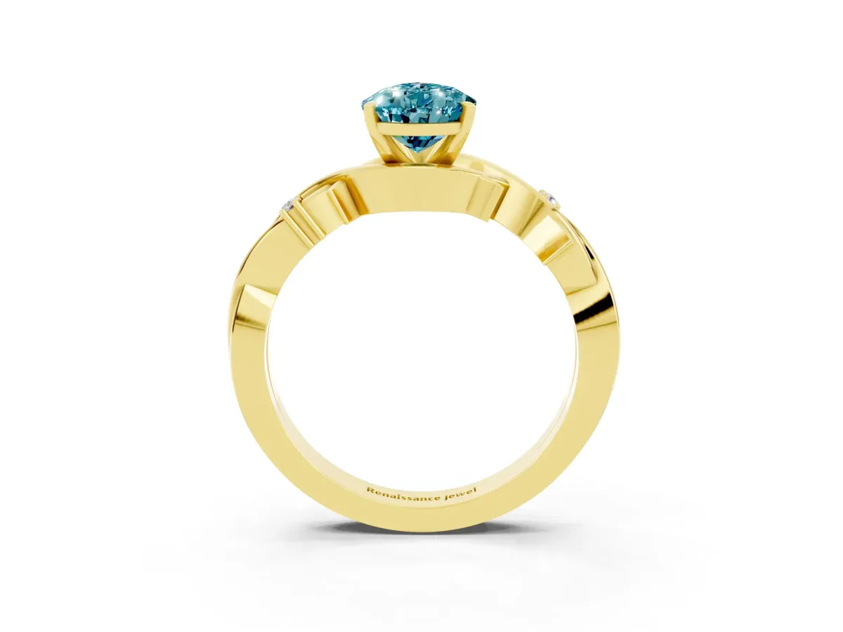 Pear Cut Blue Topaz Solitaire Ring with Twisted Band and Prong Setting Yellow gold