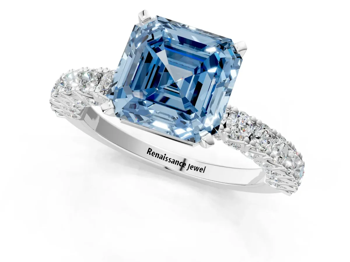 Fancy Blue Asscher Cut Diamond Solitaire Ring with Round Accent Pavé Band and Prong Setting Platinum