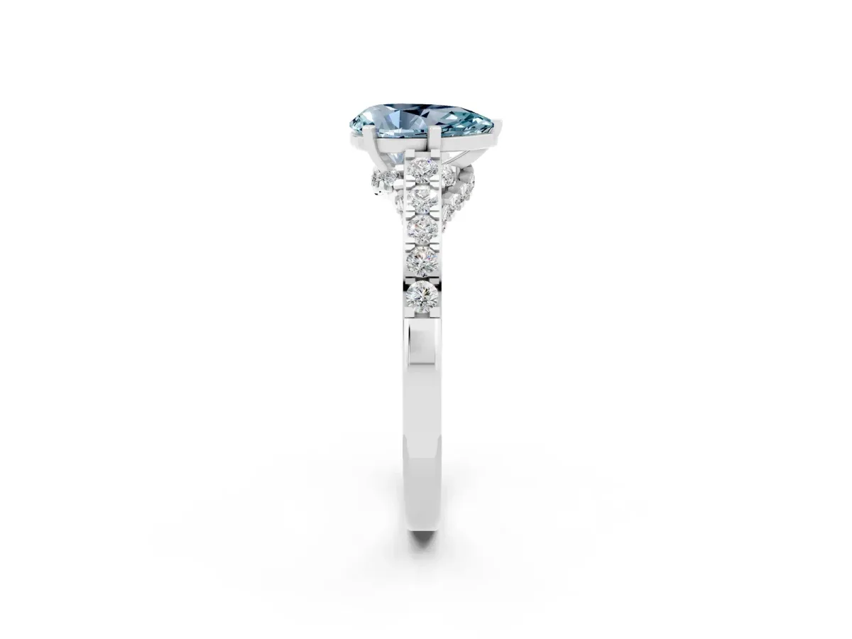 Pear Cut Aquamarine Solitaire Ring with Crossover Gallery and Round Pavé Band Silver