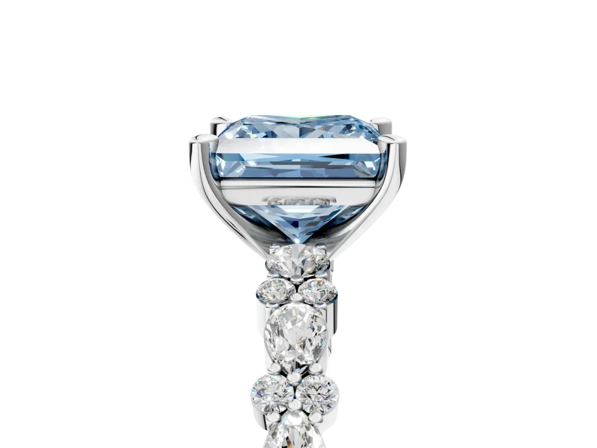 Fancy Blue Princess Cut Diamond Side Stone Solitaire Ring with Round and Four-Prong Setting Platinum