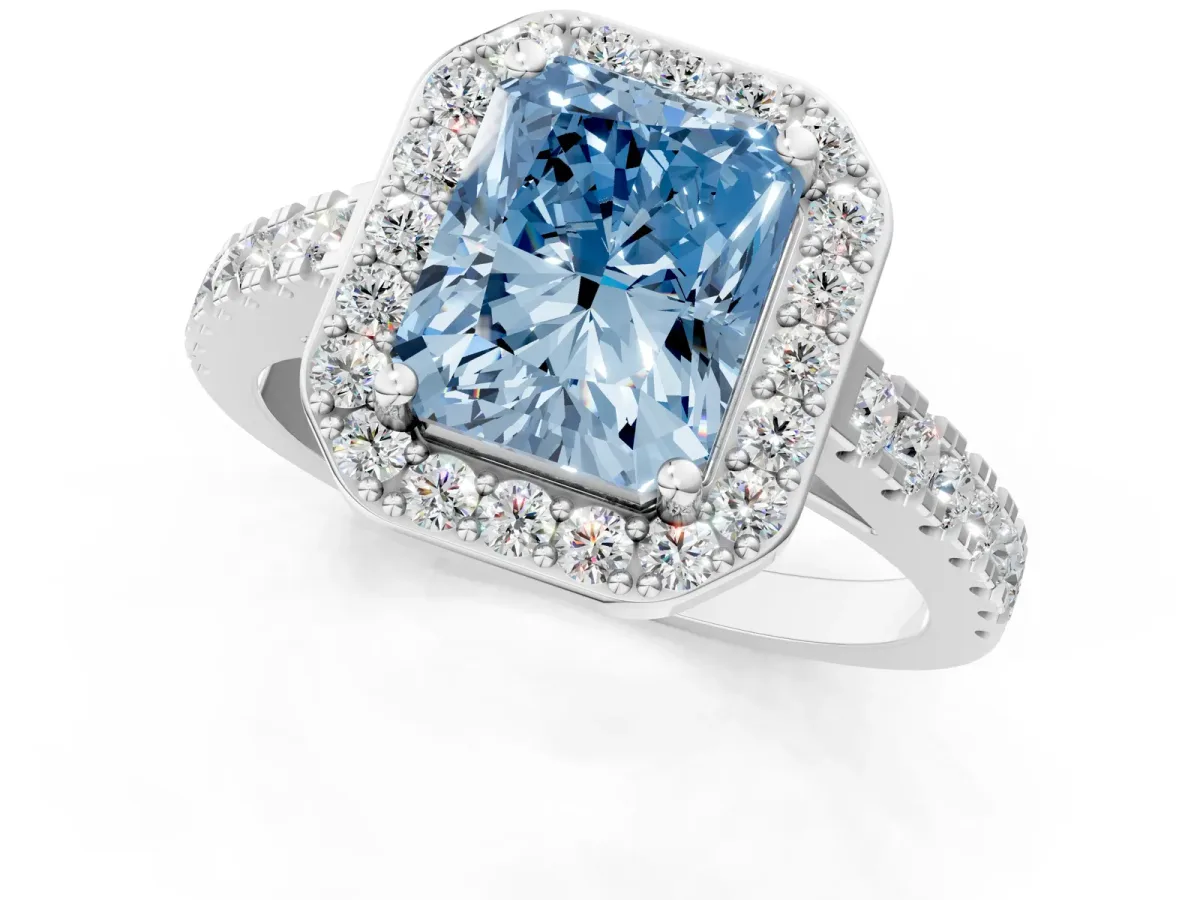 Fancy Blue Radiant Cut Diamond Halo Ring with Round Pavé Split Shank and Prong Setting Platinum