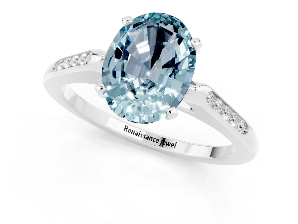 Oval Cut Aquamarine Solitaire Ring with Channel Set Round Band and Prong Setting Silver