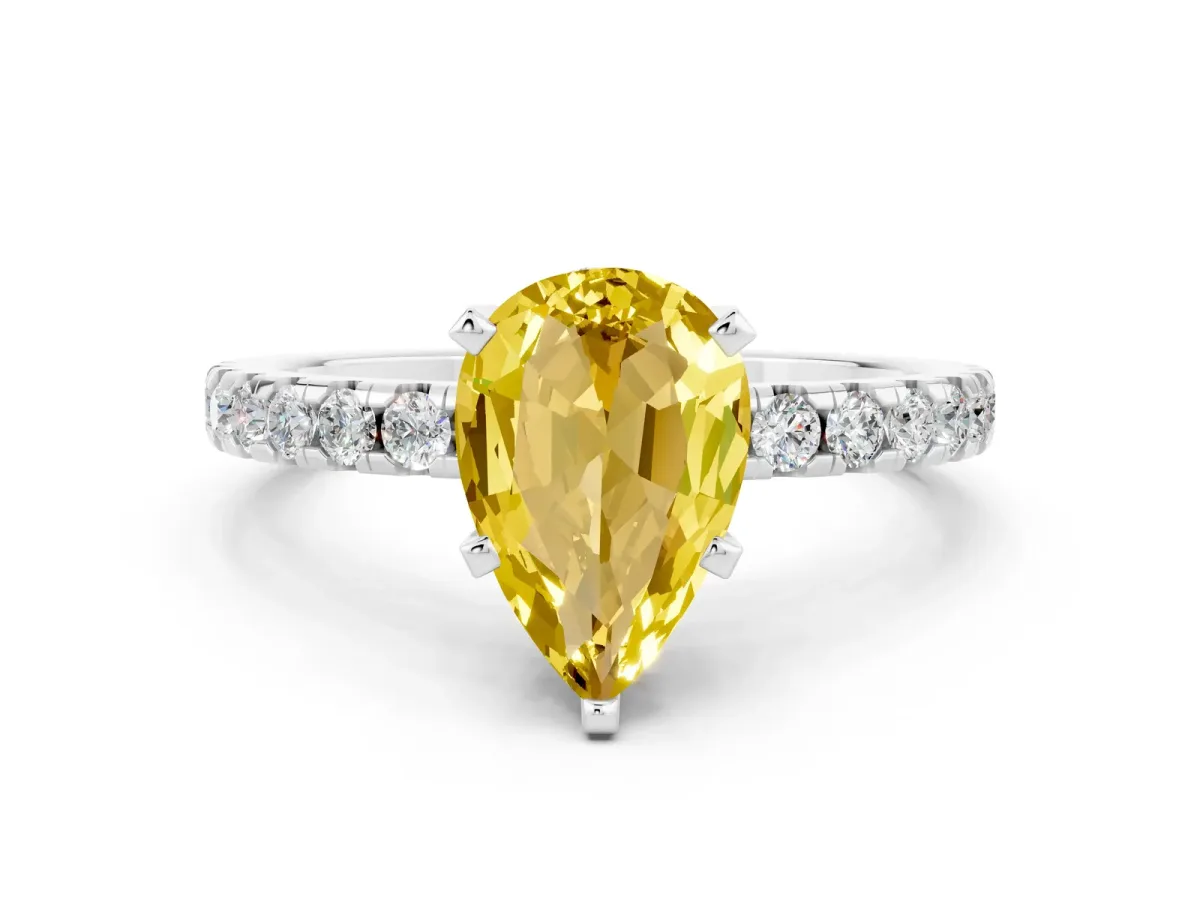 Pear Cut Yellow Sapphire Solitaire Ring with Round Pavé Band and Four-Prong Setting Silver