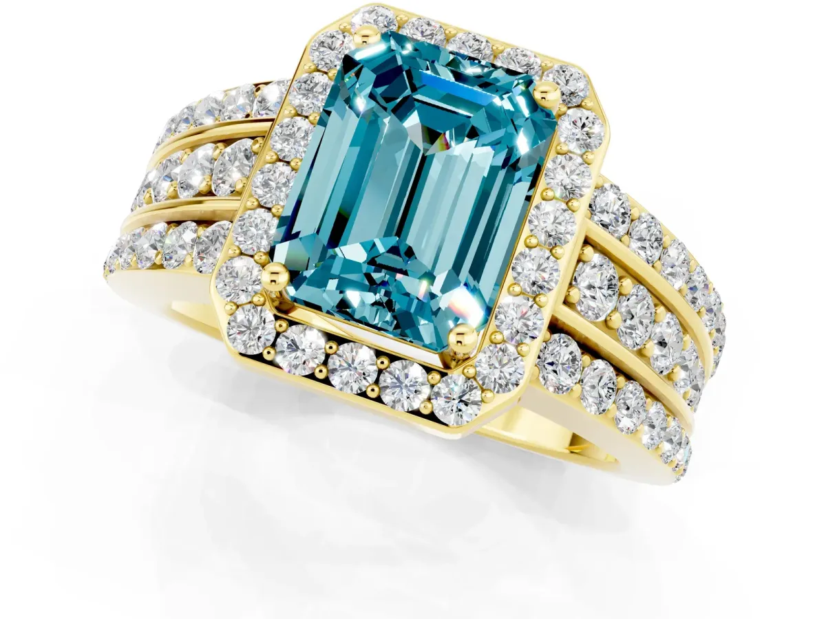 Emerald Cut Halo Blue Topaz Ring with Round Split Shank and Prong Setting Yellow gold