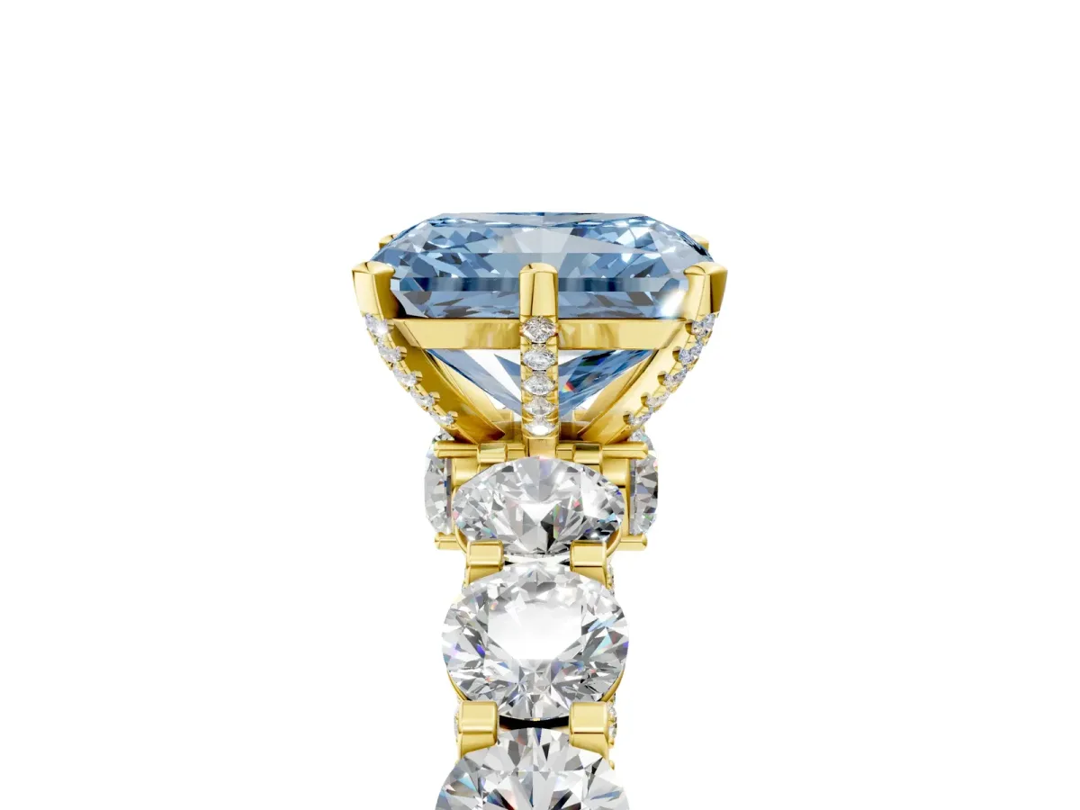 Fancy Blue Radiant Cut Diamond Side Stone Engagement Ring with Four-Prong Setting Yellow gold