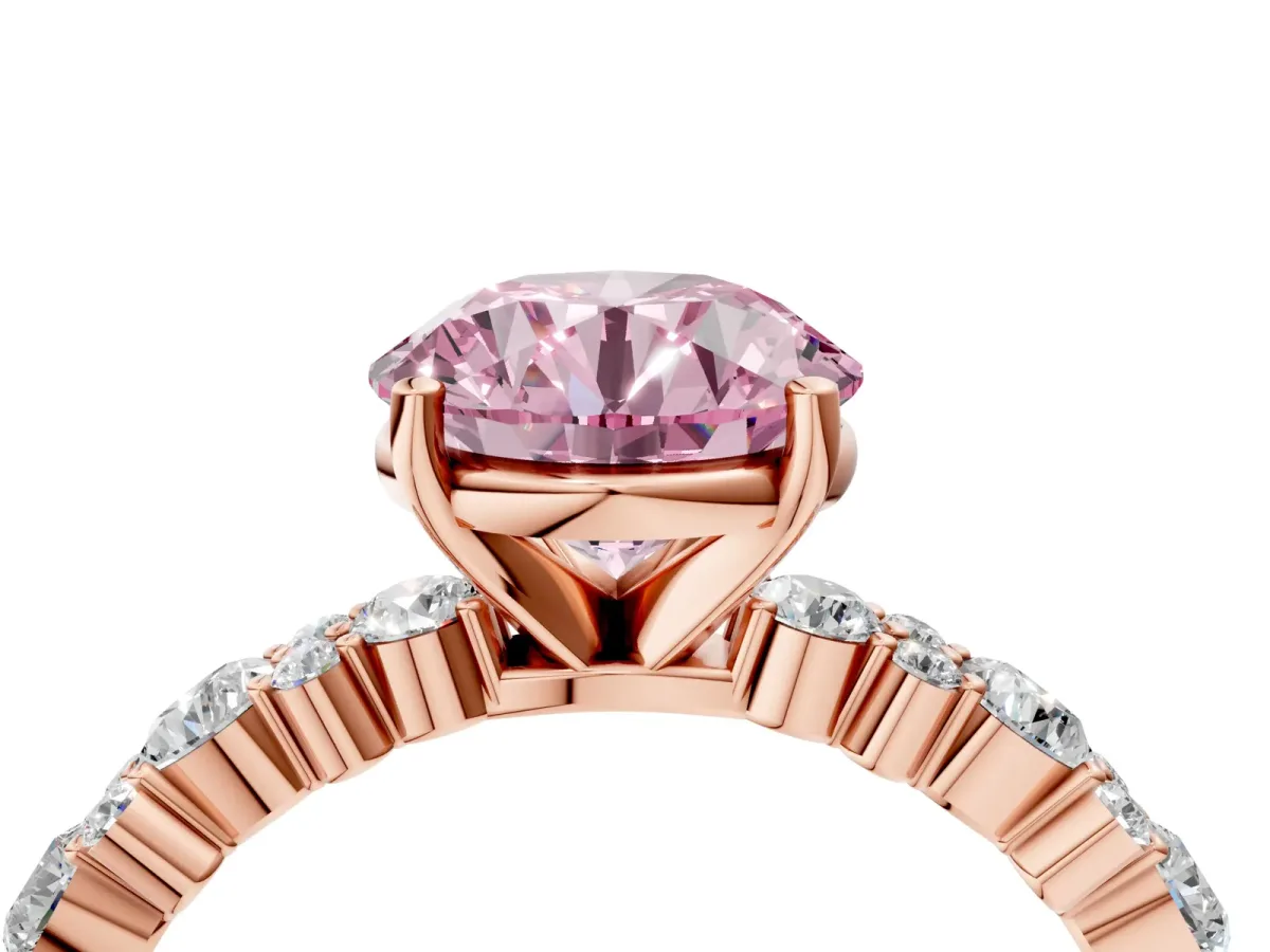 Fancy Pink Round Cut Diamond Side Stone Solitaire Ring with Round and Four-Prong Setting Rose gold