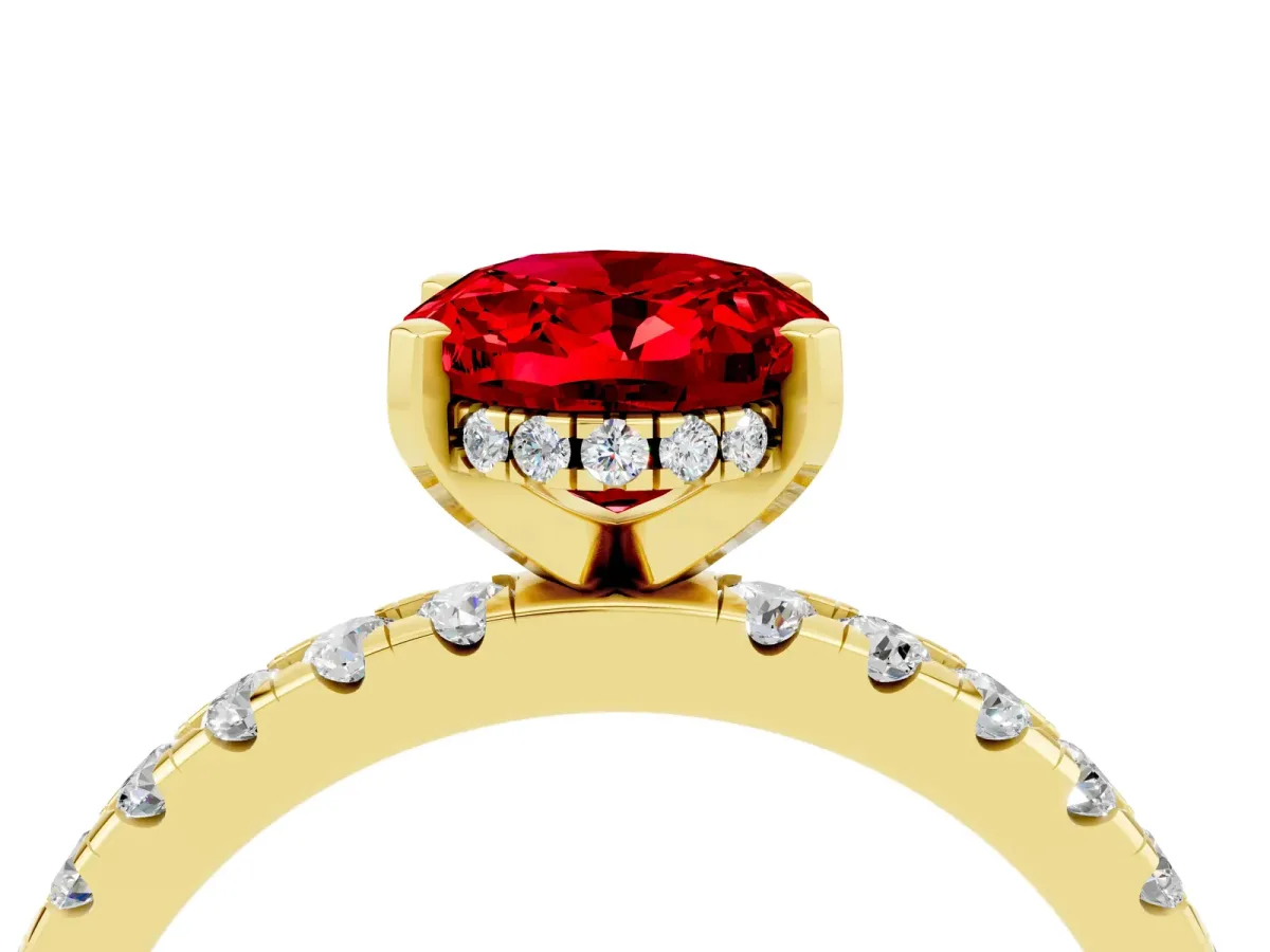 Oval Cut Ruby Solitaire Ring with Round Pavé Band and Four-Prong Setting Yellow gold