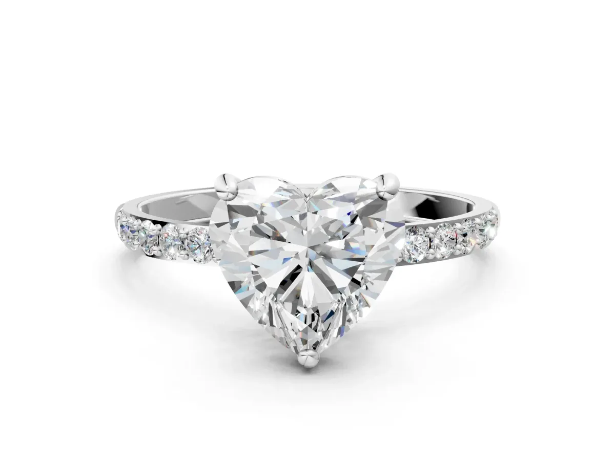 Heart Cut Diamond Solitaire Ring with Round Pavé Band and Prong Setting Silver