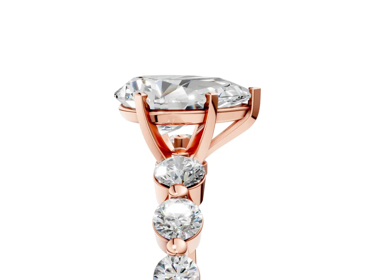 Pear Cut Solitaire Diamond Ring with Pave Band and Four-Prong Setting Rose gold