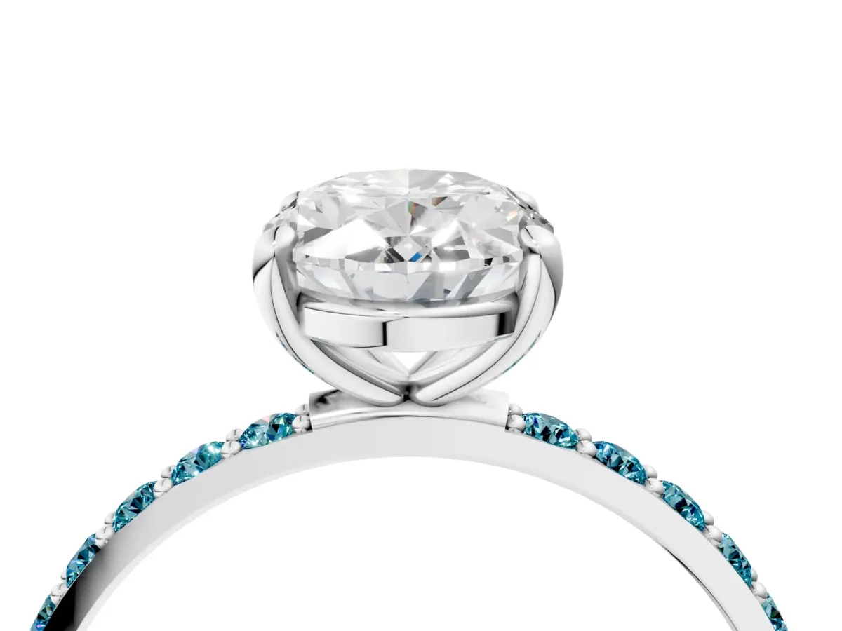 Oval Cut Diamond Solitaire Ring with Round Blue Topaz Pavé Band and Prong Setting Silver