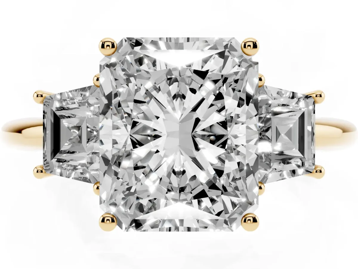 Radiant Cut Diamond Three-Stone Ring with Trapezoid Side Stones and Prong Setting Yellow gold