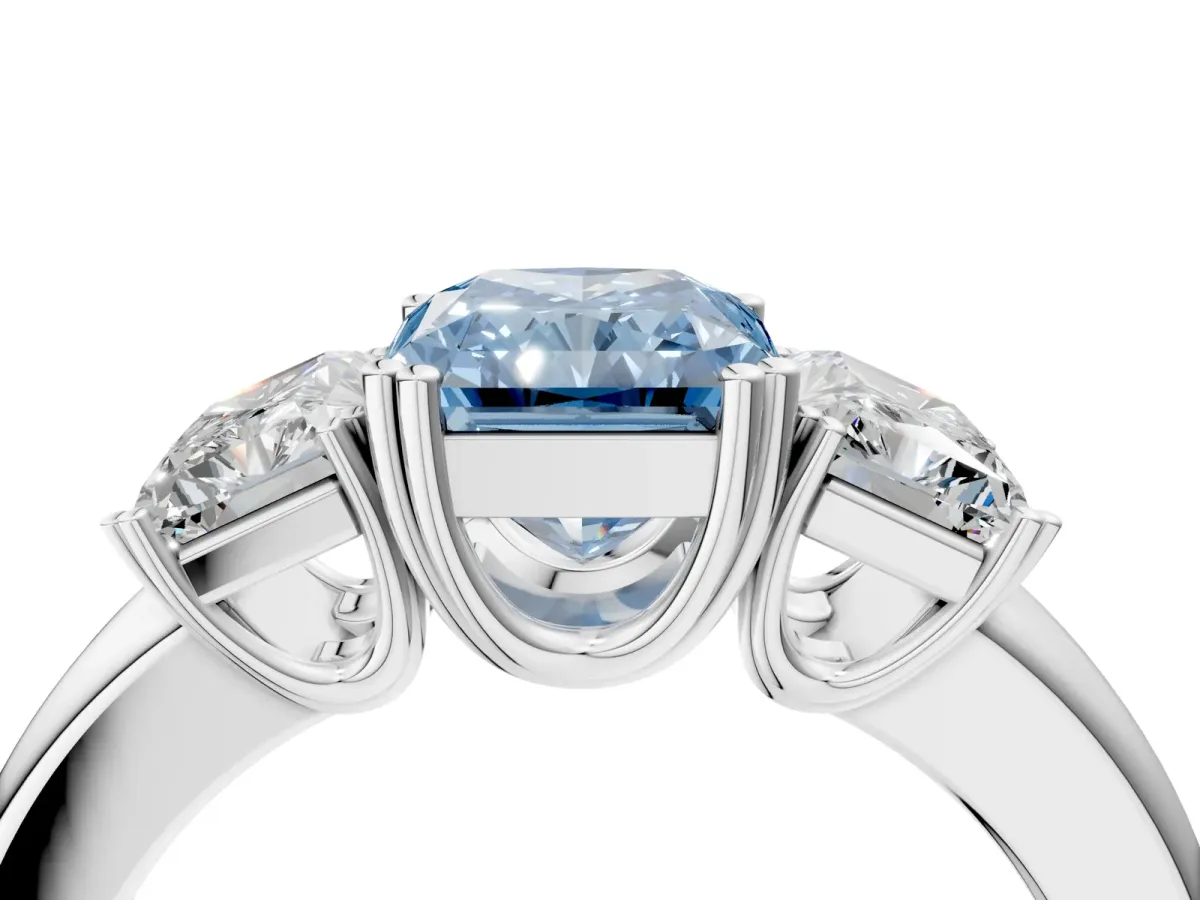 Fancy Blue Three-Stone Radiant Cut Cut Diamond Ring with Channel Set Band and Four-Prong Setting Silver
