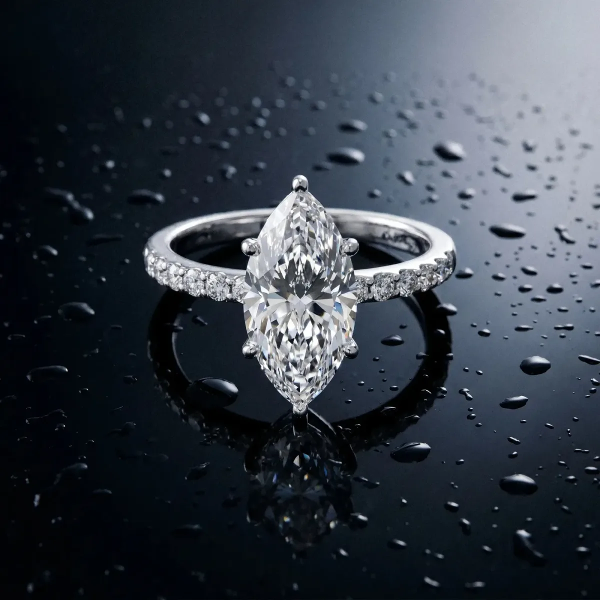 Marquise Cut Diamond Solitaire Ring with Round Pavé Shoulders and Prong Setting White gold
