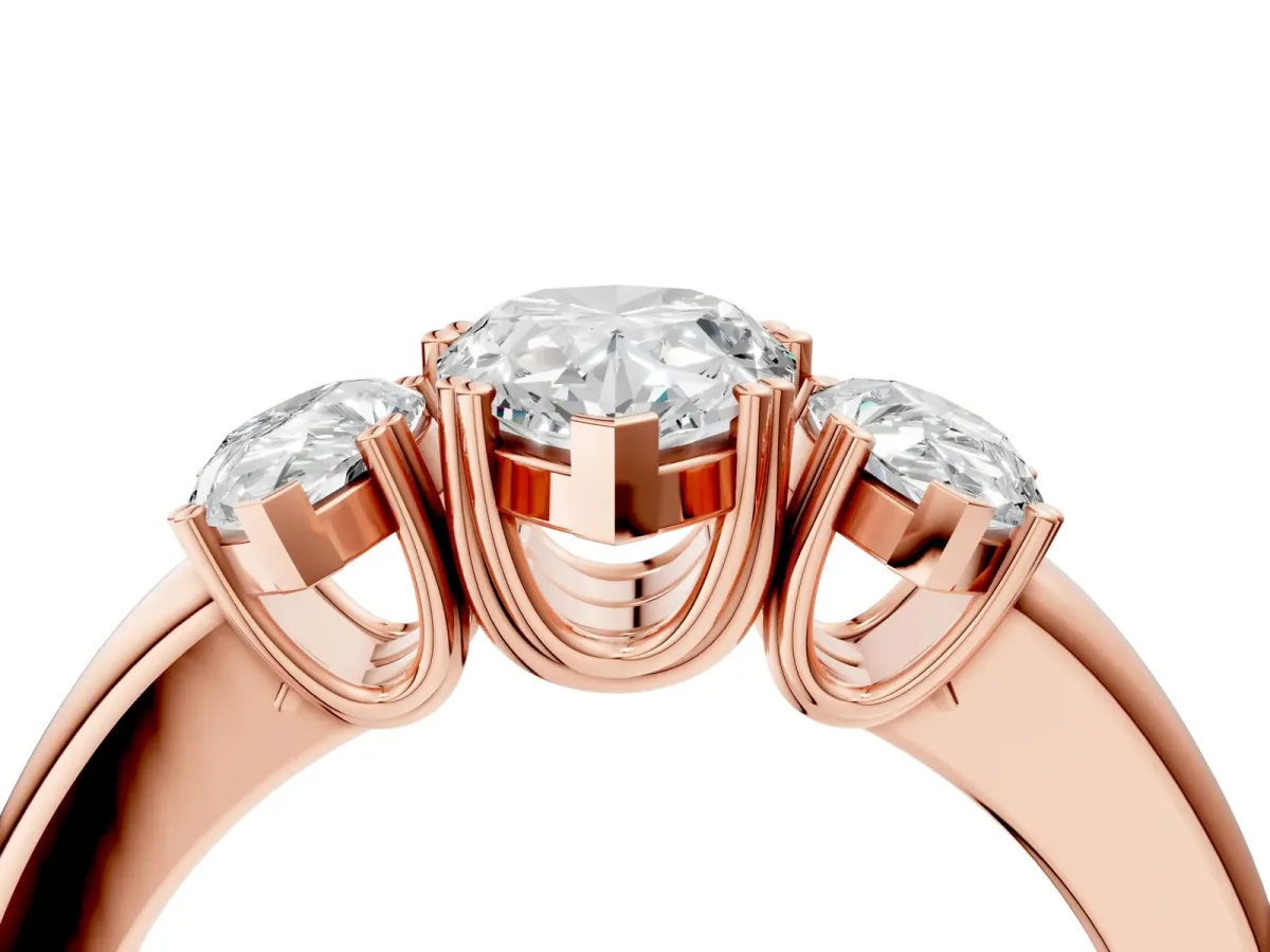 Three-Stone Pear Cut Cut Diamond Ring with Channel Set Band and Four-Prong Setting Rose gold