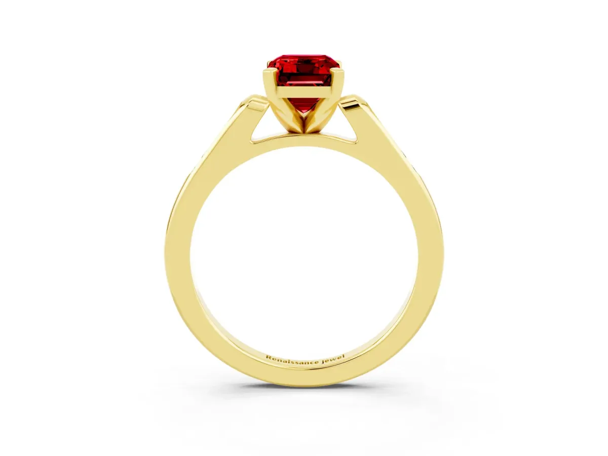 Emerald Cut Ruby Solitaire Ring with Channel Set Round Band and Prong Setting Yellow gold