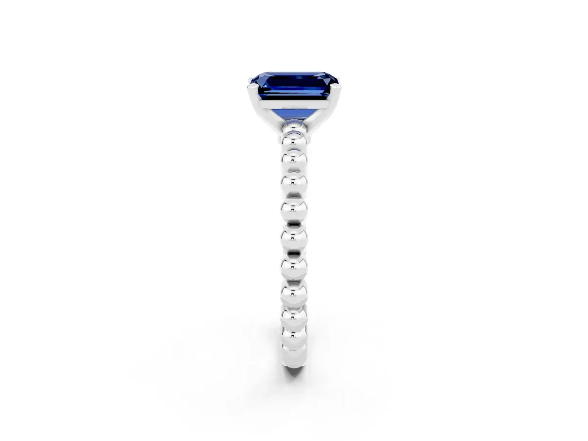 Emerald Cut Blue Sapphire Solitaire Ring with Beaded Band and Prong Setting White gold