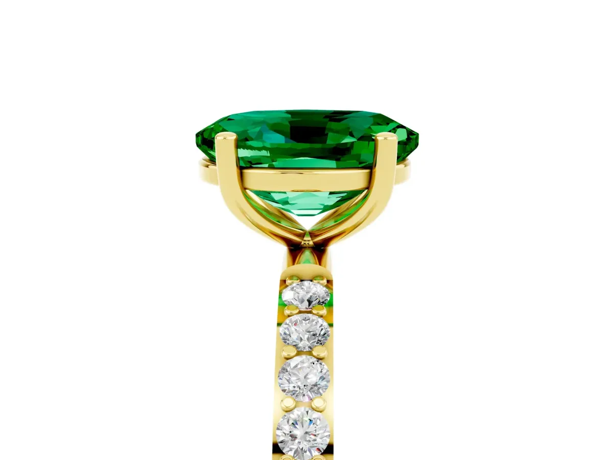 Oval Cut Emerald Solitaire Ring with Round Pavé Band and Prong Setting Yellow gold
