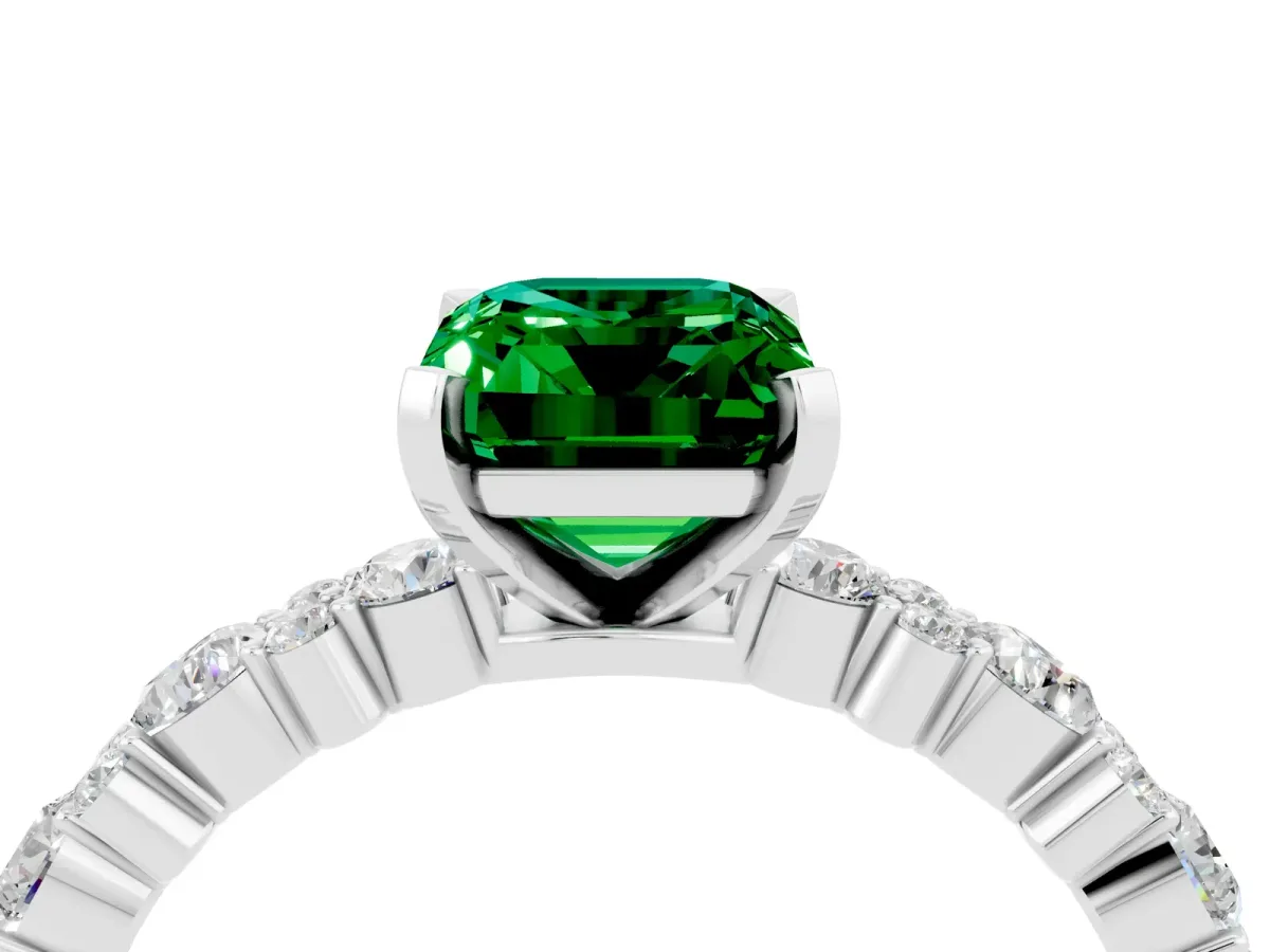 Emerald Cut Emerald Side Stone Solitaire Ring with Round and Four-Prong Setting White gold