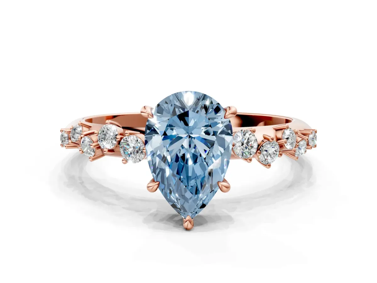 Fancy Blue Pear Cut Diamond Cluster Side Stone Solitaire Ring with Prong Setting Rose gold