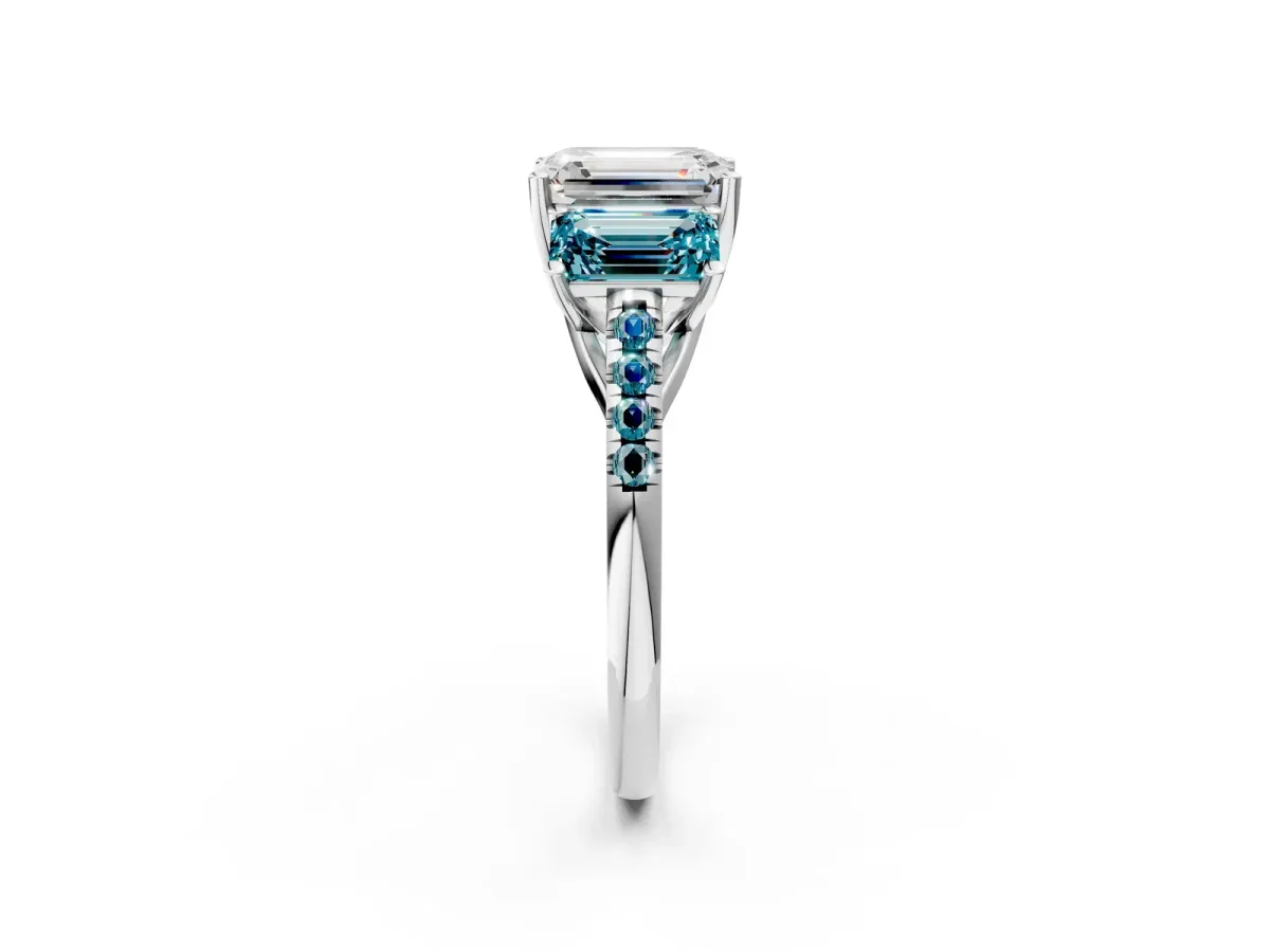 Three-Stone Emerald Cut Diamond Ring with Round Blue Topaz Pavé Band and Prong Setting Silver