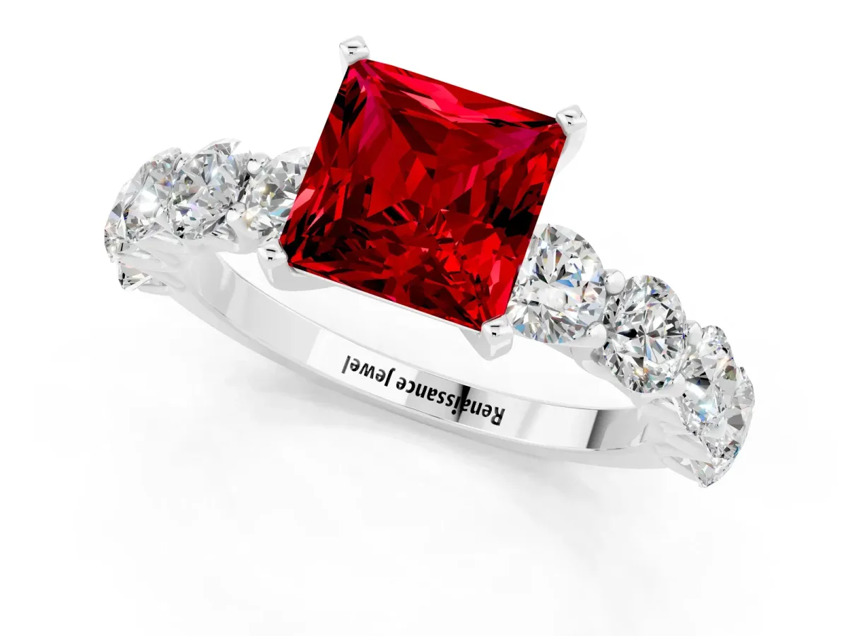 Princess Cut Ruby Prong Setting with Side Stones on a Pave Band White gold