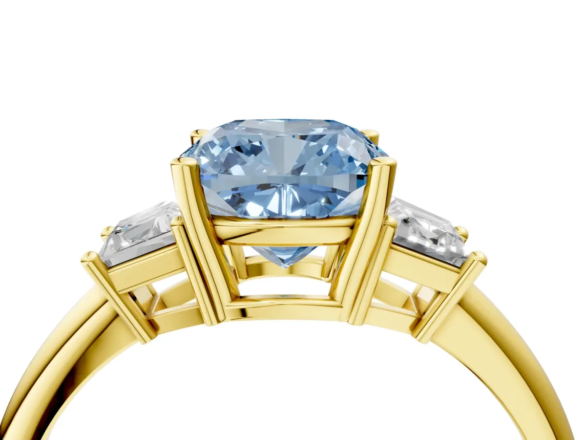Fancy Blue Cushion Cut Diamond Three-Stone Ring with Trapezoid Side Stones and Prong Setting Yellow gold