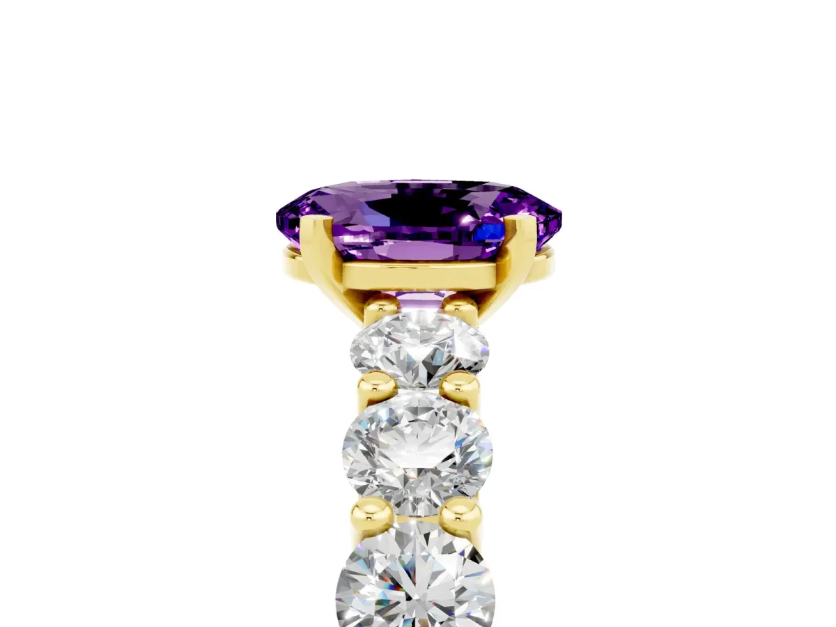 Oval Cut Amethyst Prong Setting with Side Stones on a Pave Band Yellow gold