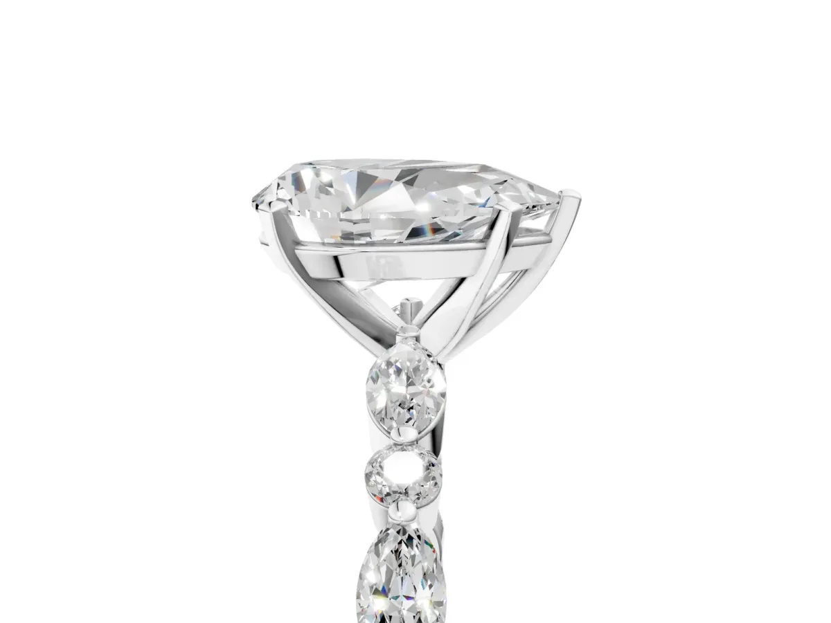Pear Cut Diamond Ring with Marquise and Round Side Stones and Four-Prong Setting Silver