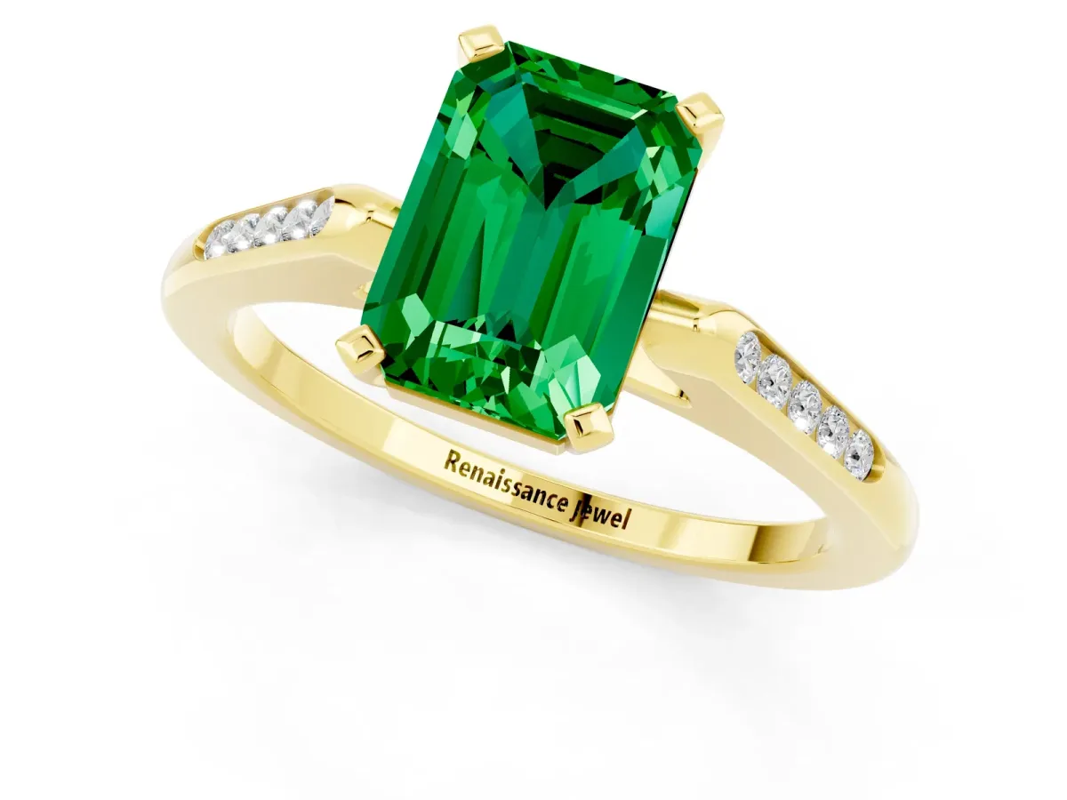 Emerald Cut Emerald Solitaire Ring with Channel Set Round Band and Prong Setting Yellow gold