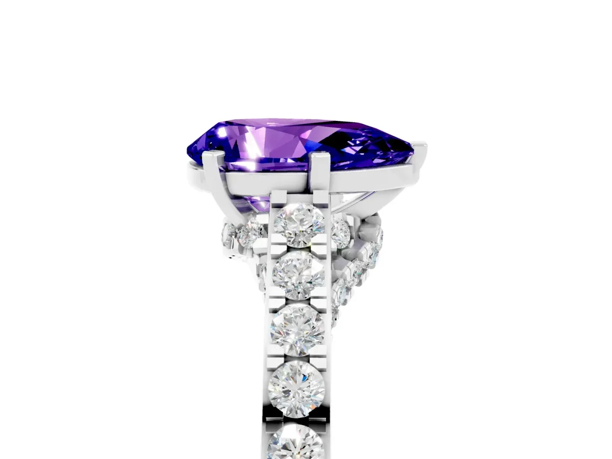 Pear Cut Tanzanite Solitaire Ring with Crossover Gallery and Round Pavé Band Silver