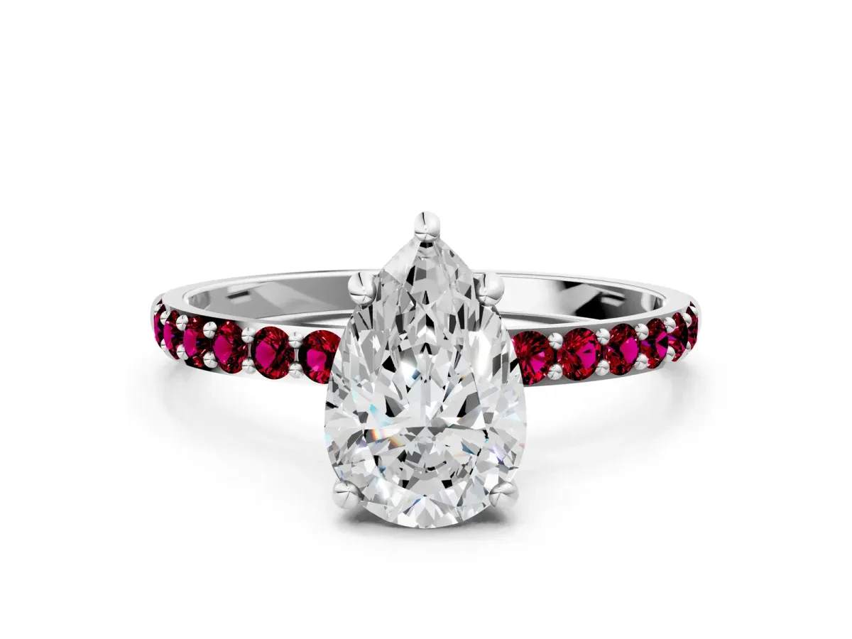 Pear Cut Diamond Solitaire Ring with Round Garnet Pavé Band and Prong Setting Silver