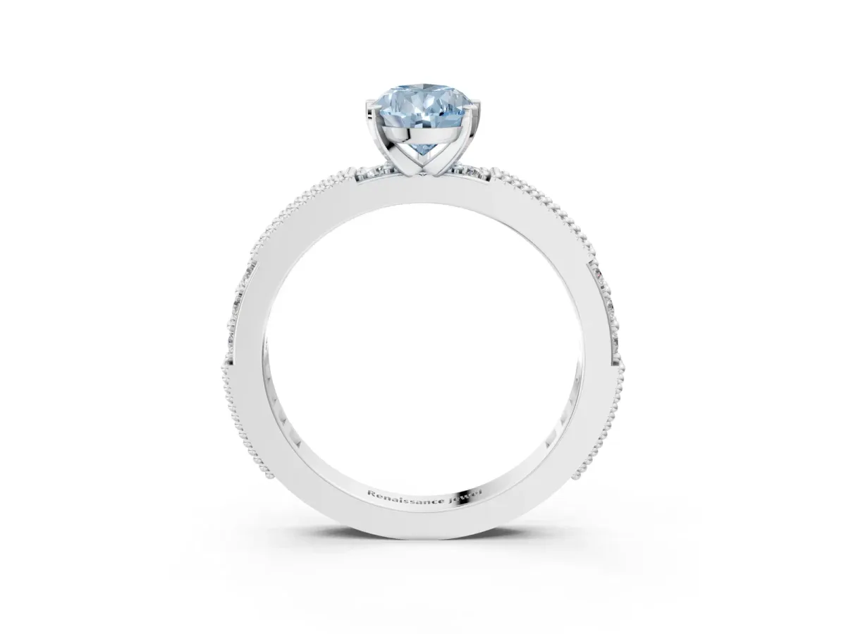 Fancy Blue Pear Cut Solitaire with Pavé Band and Four-Prong Setting Platinum