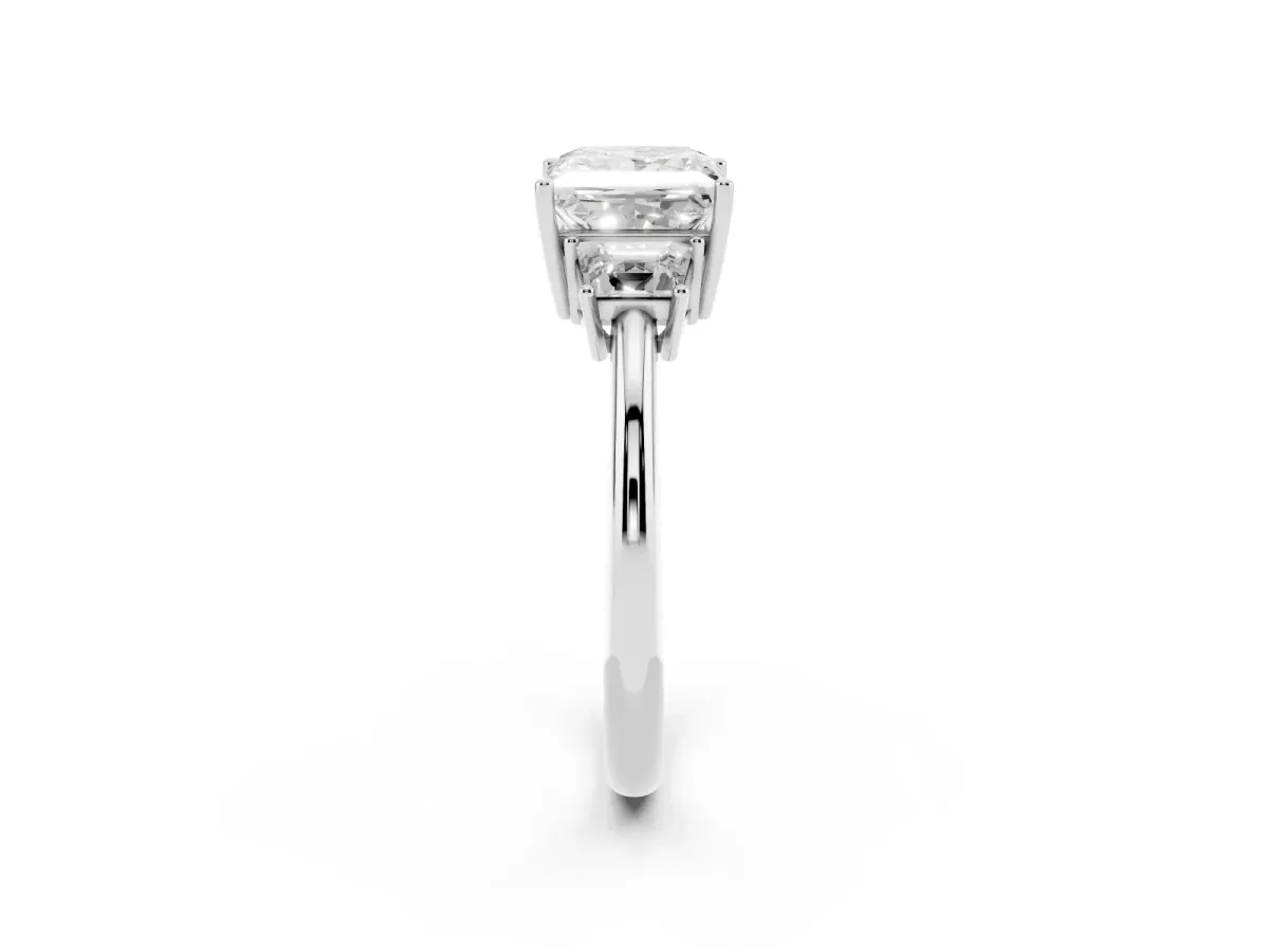 Princess Cut Diamond Three-Stone Ring with Trapezoid Side Stones and Prong Setting Platinum