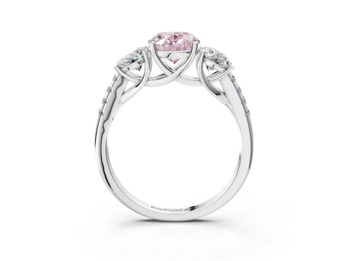 Fancy Pink Three-Stone Oval Cut Diamond Ring with Round Pavé Band and Prong Setting Silver