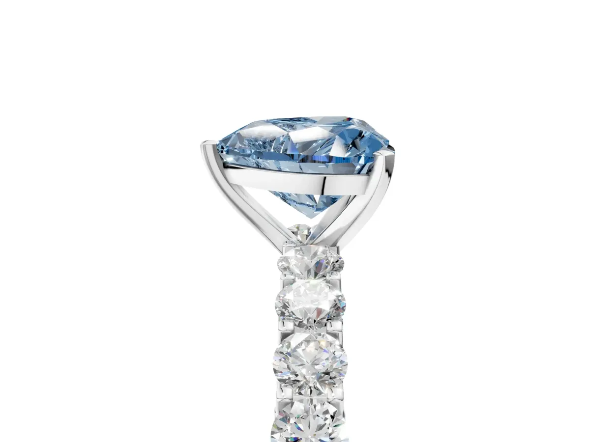 Fancy Blue Heart Cut Diamond Solitaire Ring with Shared Prong Pavé Band and Four-Prong Setting Platinum