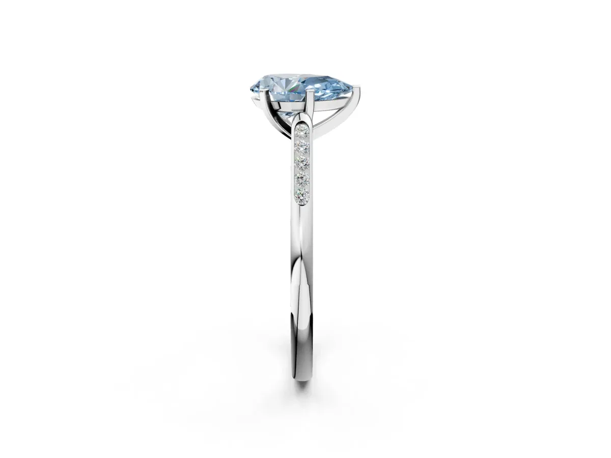 Fancy Blue Pear Cut Diamond Solitaire Ring with Channel Set Round Band and Prong Setting Platinum
