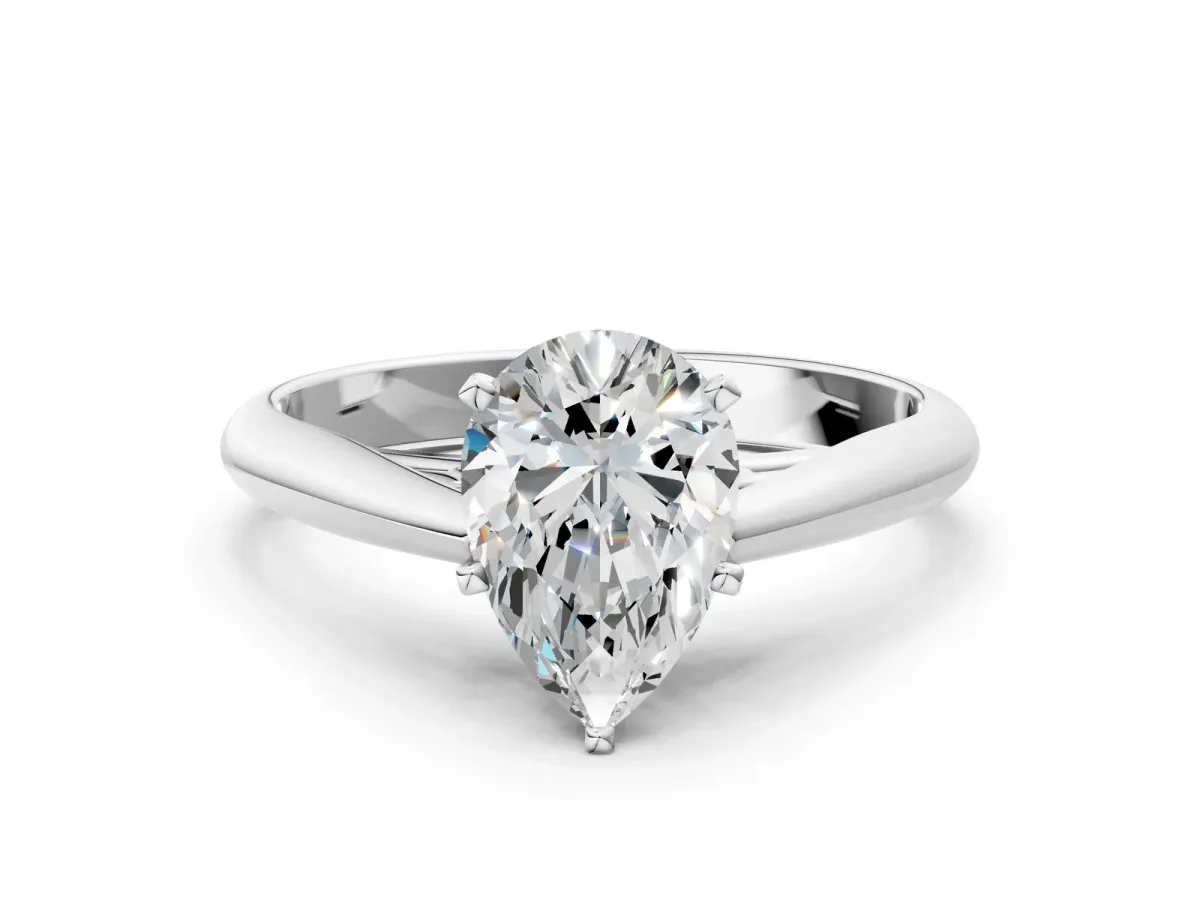 Pear Cut Diamond Solitaire Engagement Ring with Cathedral Setting and Four-Prong Mount White gold