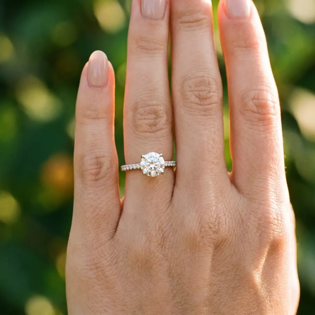 Round Cut Diamond Solitaire Ring with Classic Band and Four-Prong Setting Silver