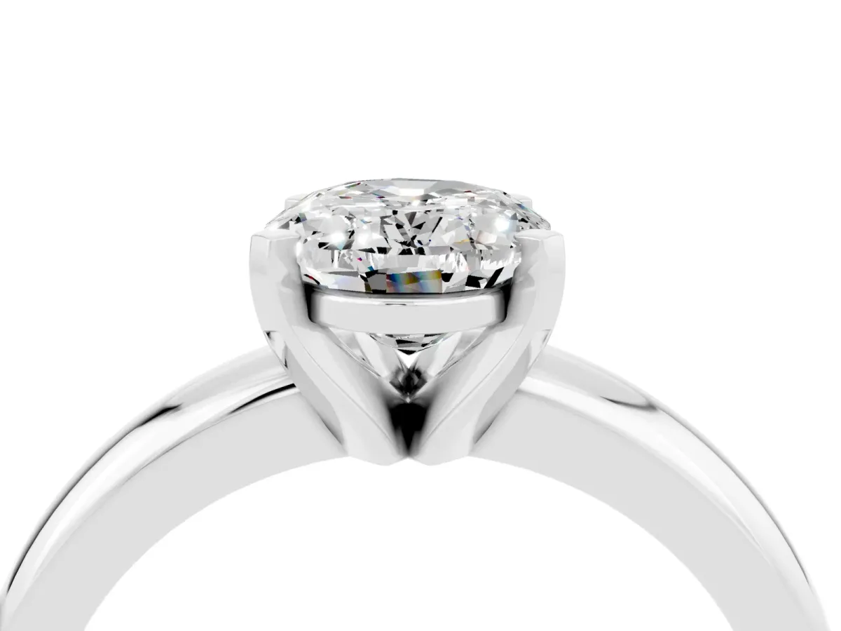 Oval Cut Moissanite Solitaire Engagement Ring with Round Band and Four-Prong Setting Silver