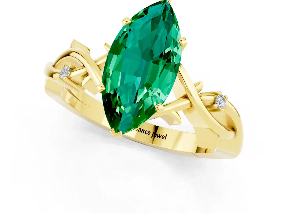 Marquise Cut Emerald Solitaire Ring with Twisted Band and Prong Setting Yellow gold