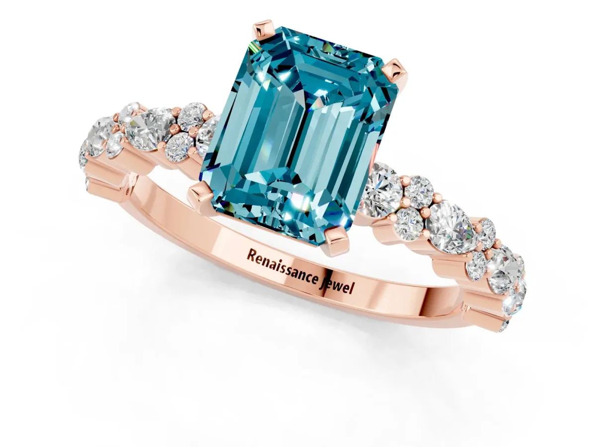 Emerald Cut Blue Topaz Side Stone Solitaire Ring with Round and Four-Prong Setting Rose gold