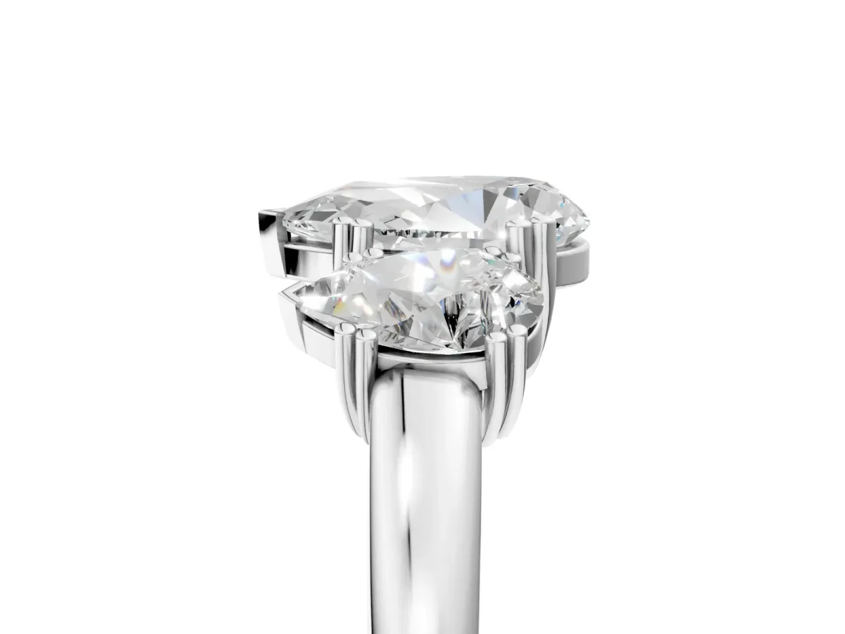 Three-Stone Pear Cut Cut Diamond Ring with Channel Set Band and Four-Prong Setting White gold