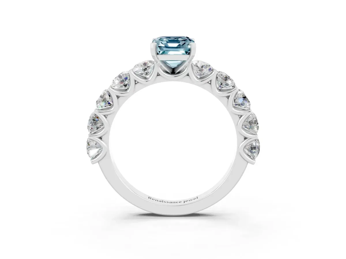Emerald Cut Aquamarine Prong Setting with Side Stones on a Pave Band Silver