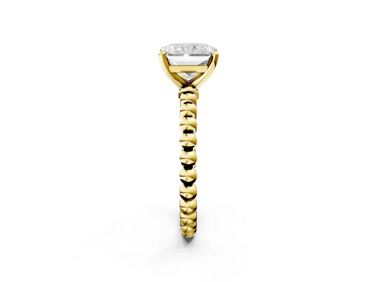 Radiant Cut Diamond Solitaire Ring with Beaded Band and Prong Setting Yellow gold