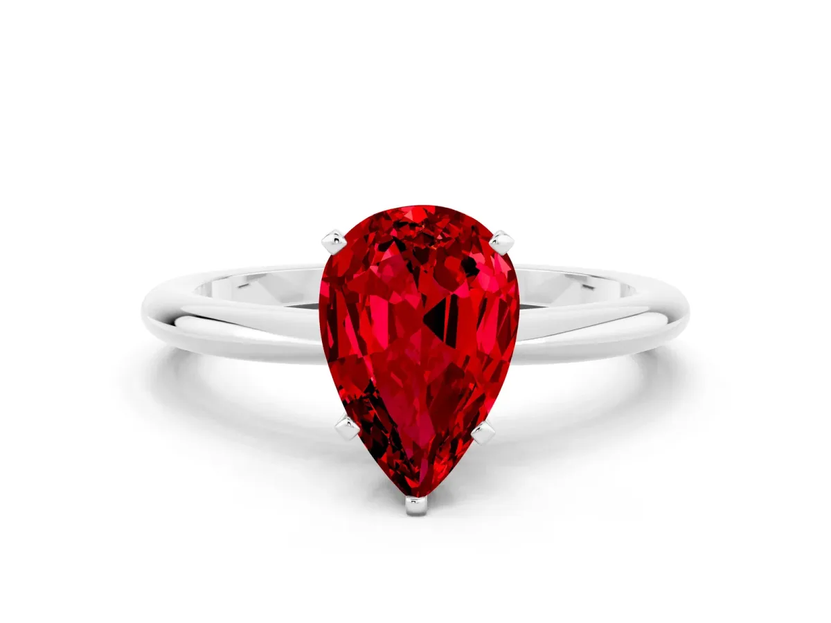 Pear Cut Ruby Solitaire Ring with Six-Prong Setting and Classic Band Platinum