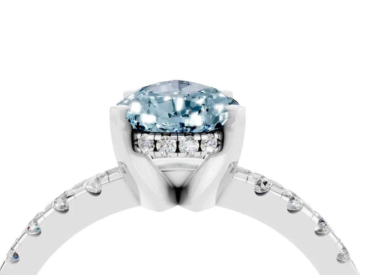 Pear Cut Aquamarine Solitaire Ring with Round Pavé Band and Four-Prong Setting Silver
