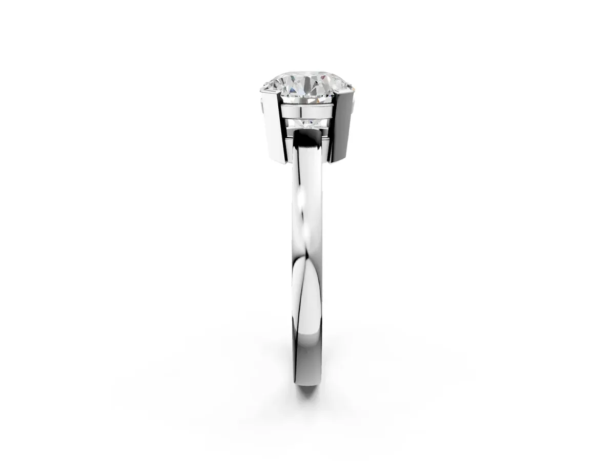 Round Cut Cut Solitaire Ring with Four-Prong Setting and Classic Band Silver
