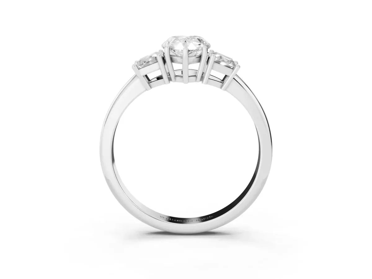 Pear Cut Diamond Three-Stone Ring with Trapezoid Side Stones and Prong Setting Platinum