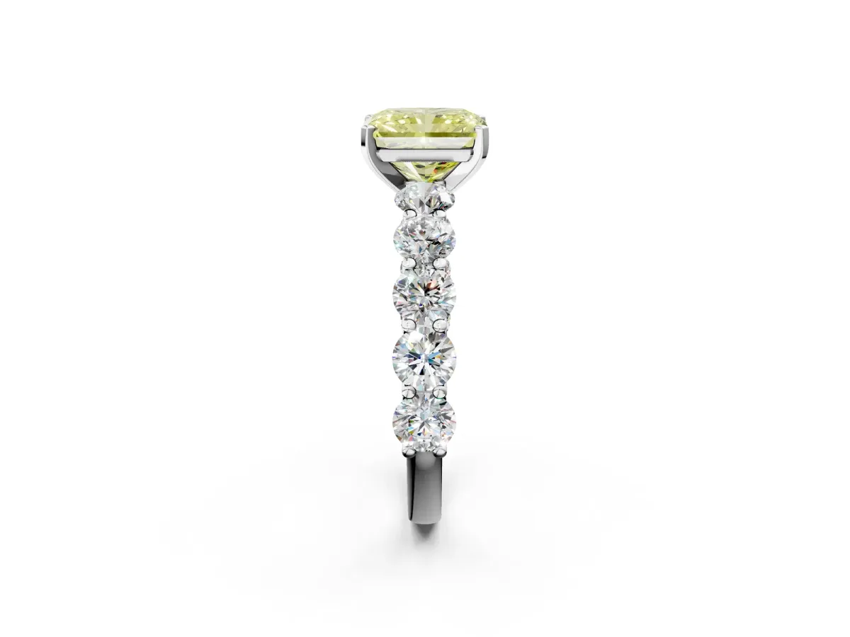 Fancy Yellow Radiant Cut Diamond Prong Setting with Side Stones on a Pave Band Silver