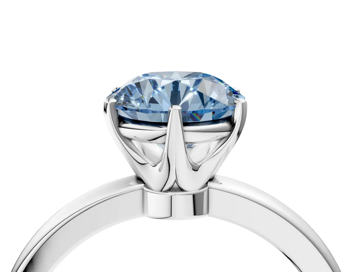 Fancy Blue Round Cut Solitaire Diamond Ring with Six-Prong Setting on a Classic Band White gold